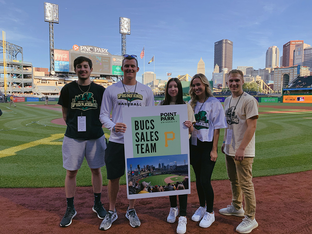 Students on the Pittsburgh Pirates Bucs Sales Team pose for a photo at PNC Park. Submitted photo.