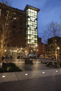 This is a photo of Village Park, part of the Academic Village Initiative, at night.