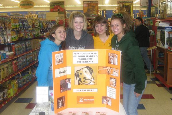Members of the Point Park Green and Gold Society collected pet food and cash donations to help homel