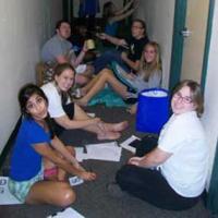 Students in the Silver Screen LLC (2010-11) gather in the hall to work on a project together.