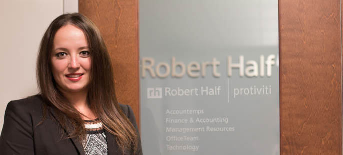 Pictured is Daria Opekunova, a native of Russia, M.B.A. alumna and staffing manager for Robert Half International. | Photo by Victoria A. Mikula