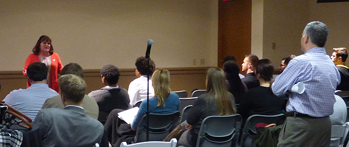 Pictured is Theresa Anderson, Southwest Airlines station manager, discussing ethical leadership with Point Park M.B.A. students. | Photo by David Rowell, M.F.A.