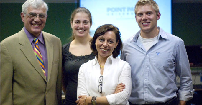 Professor John Kudlac, director of the master of science in environmental studies program, with three students from the first class. | Photo by Christopheer Rolinson