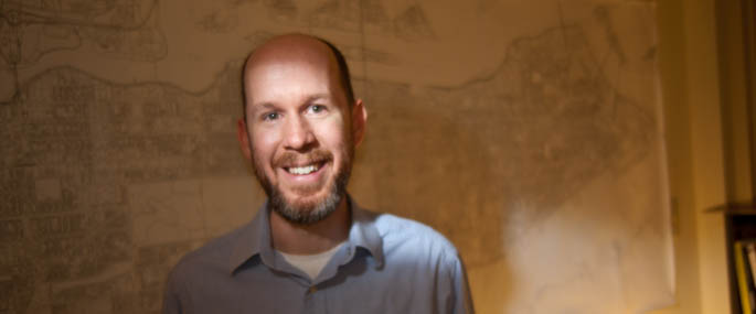 Pictured is Robert Ross, Ph.D., assistant professor of global cultural studies. | Photo by Chris Rolinson