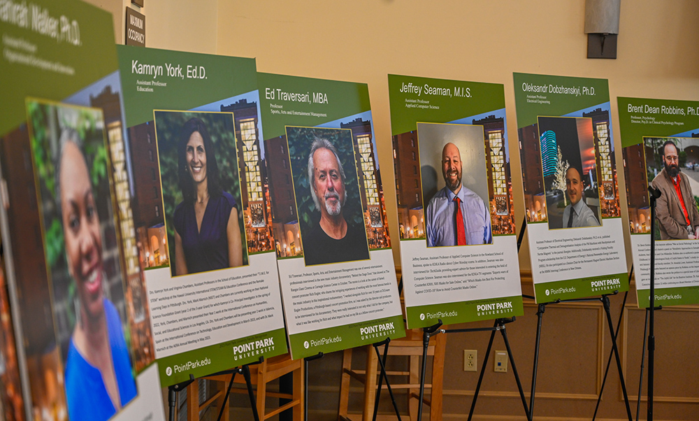 Pictured are faculty posters. Photo by Joey Bova.