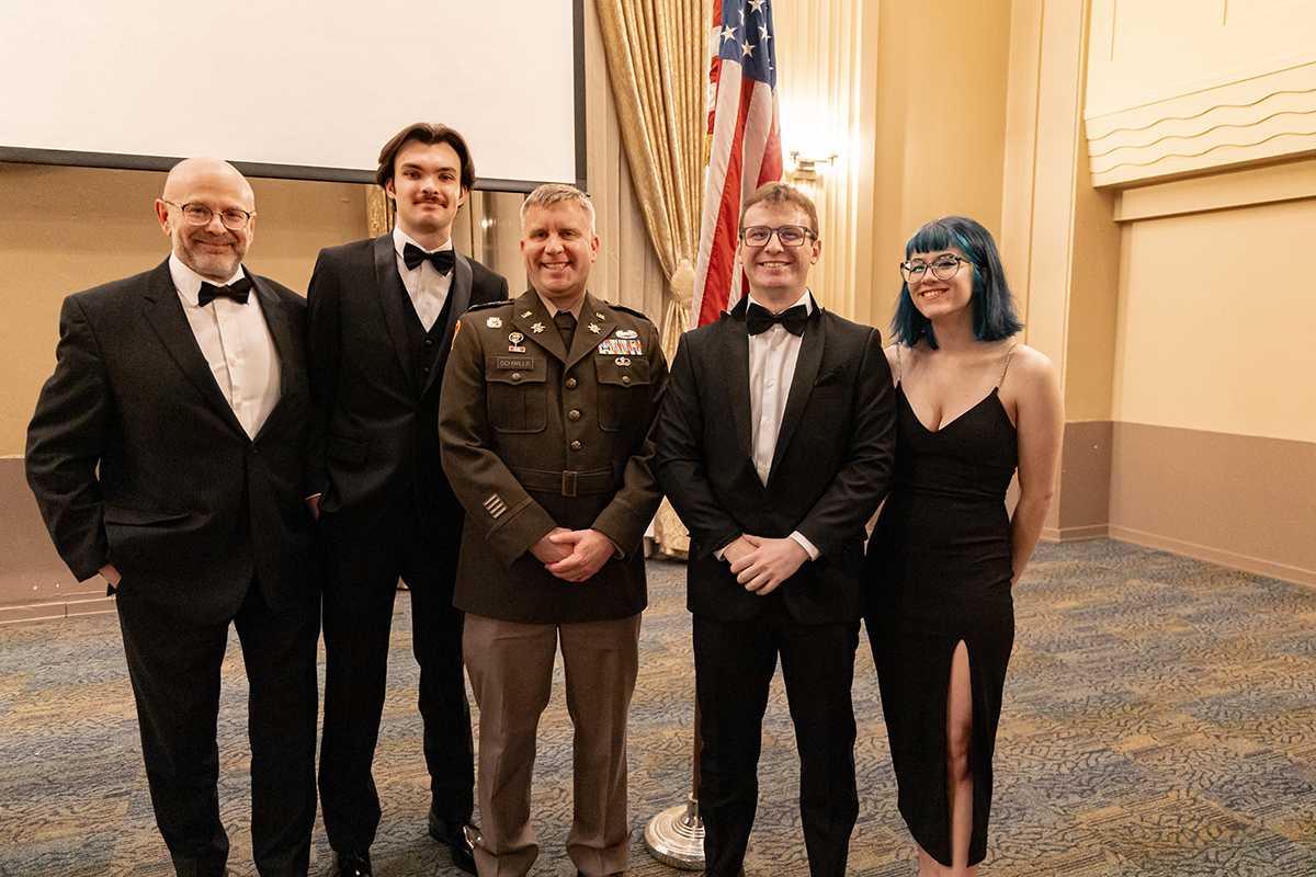 Pictured are Professor Sean Martin, Patrick Sullivan, Major Michael Schwille, Anthony Billy and Juliet Jacob. Photo by Ethan Stoner.