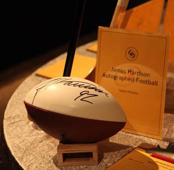 Football autographed by Steeler James Harrison was among the silent auction items at History Uncorked. | Photo by Andrew Weier