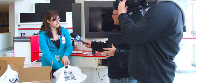 Pictured is an SAEM student doing a media interview prior to the Bon Jovi concert. | Photo by David Rowell