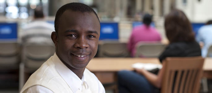 Portrait of MBA international student Alphonse Tounkara, from Guinea, West Africa. 
