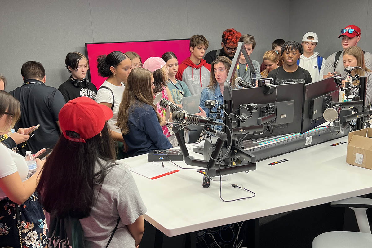 Students in the iHeart Media studios with Ally Bear from 96.1 KISS.
