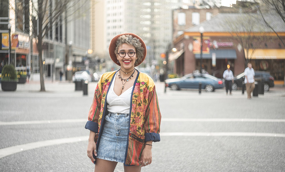 Pictured is a Point Park student in Market Square. Photo by Matt Metrovich