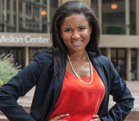 Pictured is BNY Mellon analyst Melisa Chipangila Campbell, a 2009 economics and finance and 2011 M.B.A. alumna. | Photo by Chris Rolinson