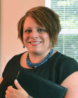 Pictured is Melissa Ferraro, M.A. in organizational leadership alumna and development director for Sisters Place, Inc. | Photo by Jim Judkis