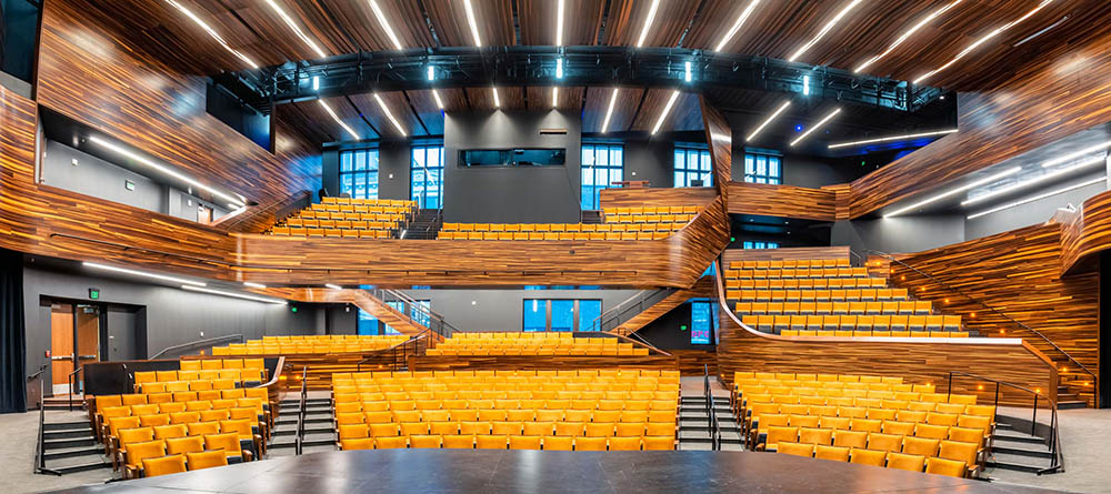 The 550-seat PNC Theatre whose backstage and inner workings are visible from the street, resulting in an intentional glimpse into performing arts classes. Photo | Nick Koehler 