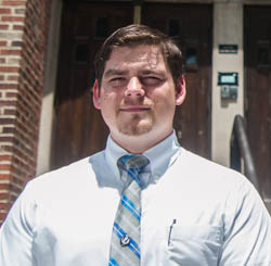 Pictured is Justin Morgan, a secondary education alumnus and English teacher at Central Catholic High School. | Photo by Chris Rolinson