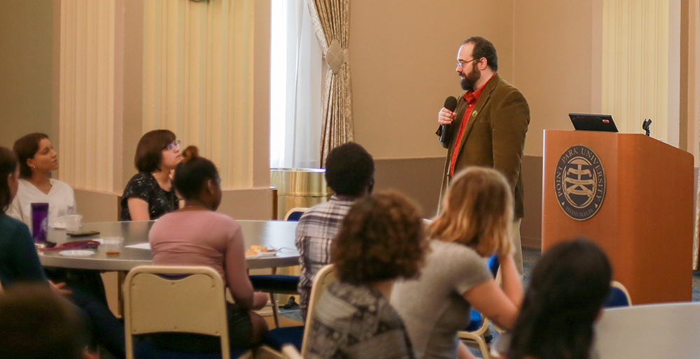 Pictured is Dr. Brent Robbins speaking to students in the Lawrence Hall ballroom. File photo.