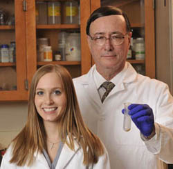 Pictured are Dr. Mark Farrell and biological sciences alumna Michelle Guaragno.