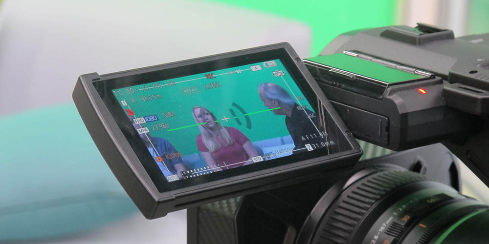 A photo and video shoot in Point Park's Center for Media Innovation.