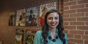 Pictured is Emily Bastaroli in the office of WHIRL magazine. Photo | Christopher Rolinson