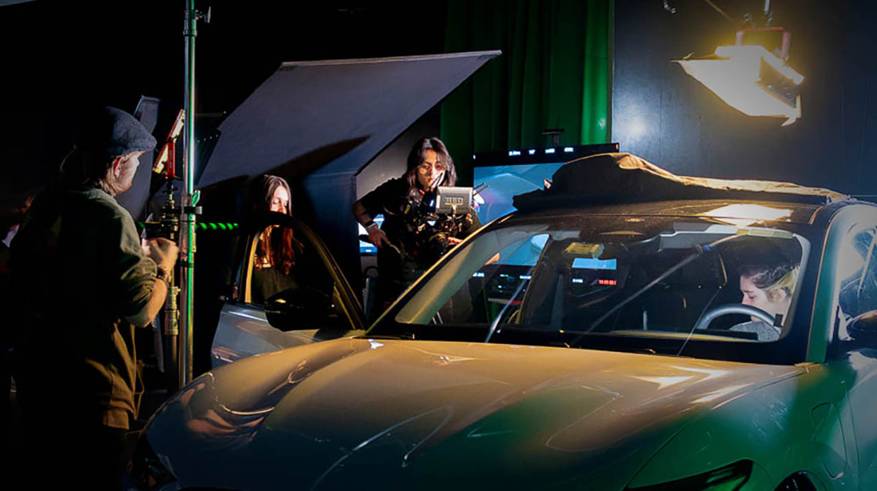 Students on set of the soundstage on campus. 