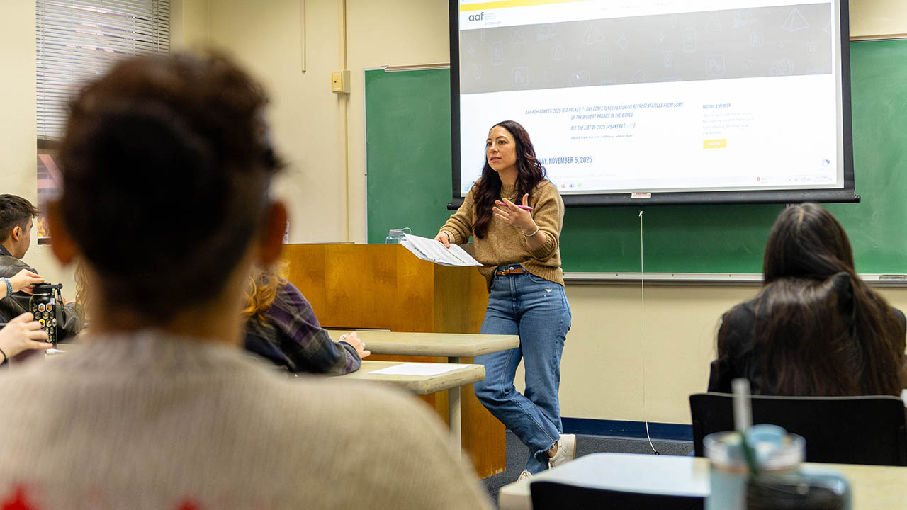 Pictured is Jenna Lo Castro teaching in Academic Hall. Photo | Paul Koontz