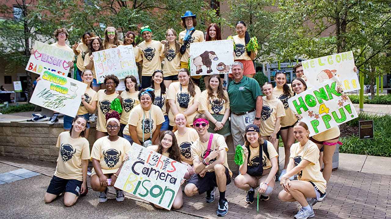 Students with President Chris Brussalis at 2024 move-in day. Photo | Ethan Stoner