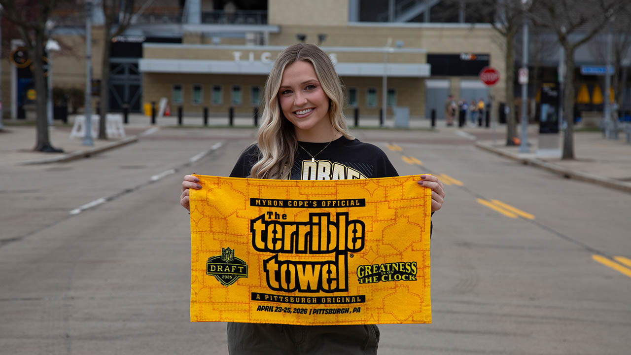 Pictured is alumna Payton Comunale with a Terrible Towel. 