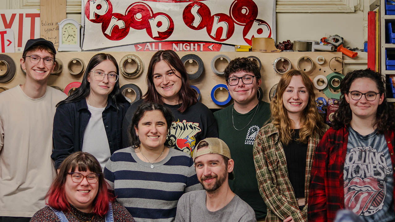 Pictured are Prop Shop supervisors Katie Mikula-Wineman and Jim Utz, front, with theatre production students in the Prop Shop. Photo by Natalie Caine '25.