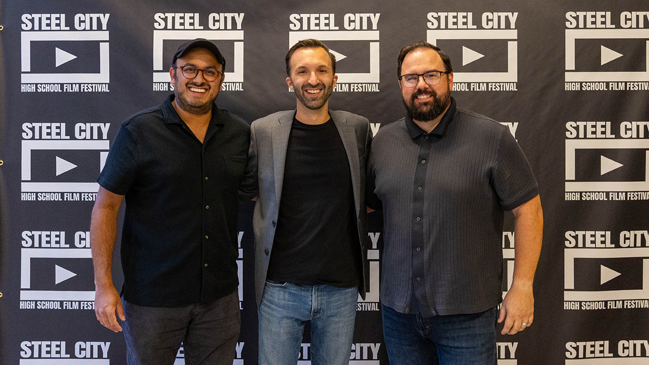 (L-R) Alumni Kevin Kaufmann, Mike Day and Dean Fisher, Fog of War filmmakers. Photo | Paul Koontz