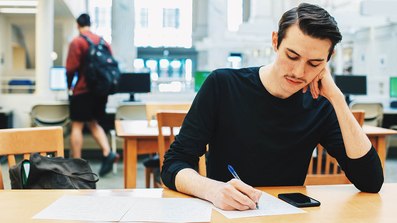 A student in the library. Photo | Chancelor Humphrey.