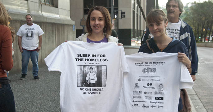 Point Park students hold up their new Sleep-in for the Homeless T-shirts as part of an October, 2010, community service project in Downtown Pittsburgh. | Photo by Gabrielle Mazza.