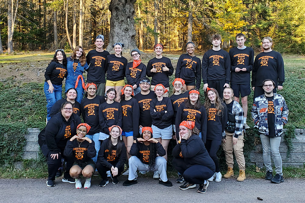 A group of students pose at Pioneer Adventure Weekend.