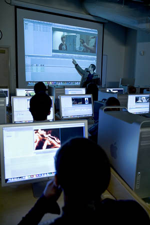An instructor leads a Cinema and Digital Arts class. | Photo by Frank Walsh