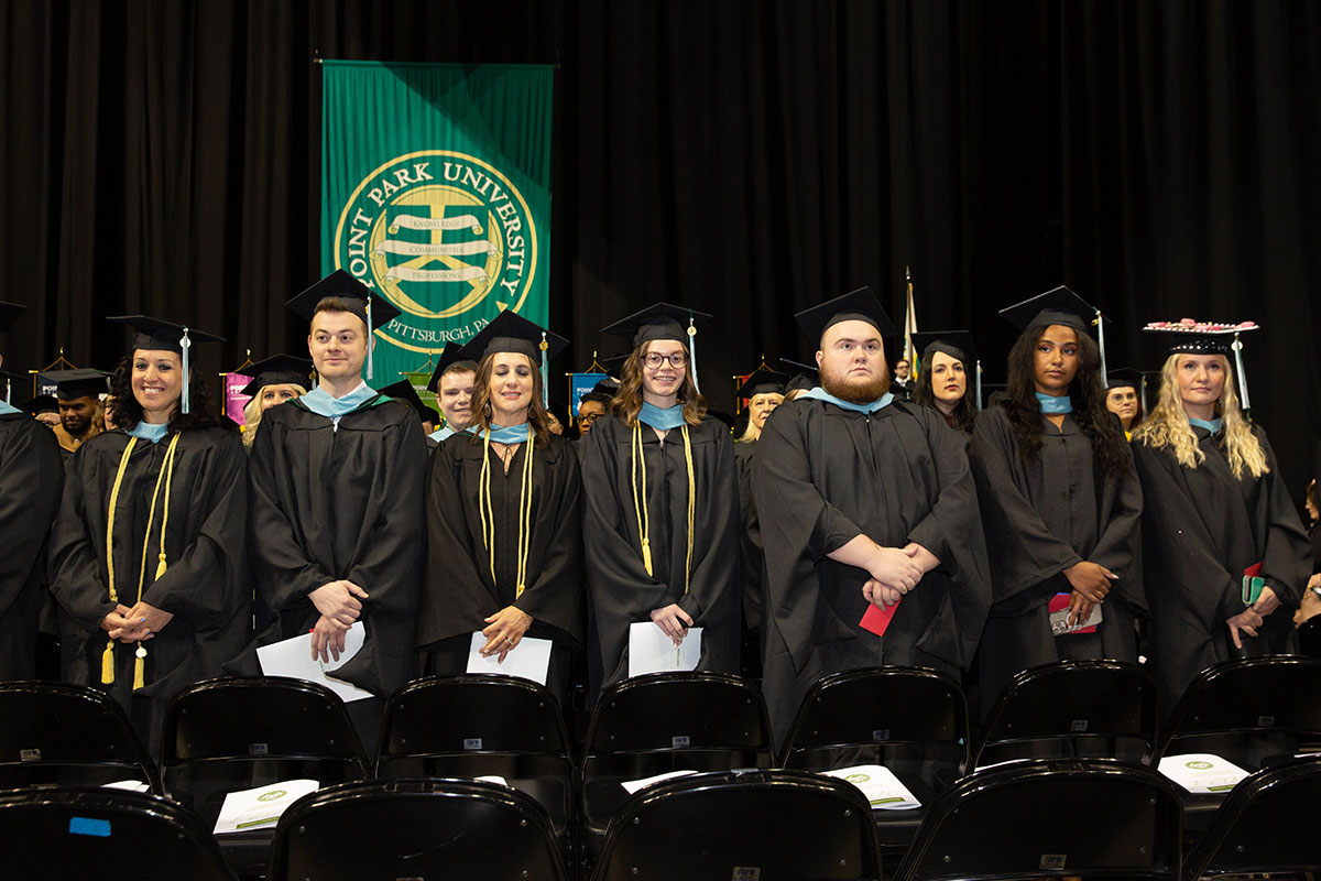A row of graduates