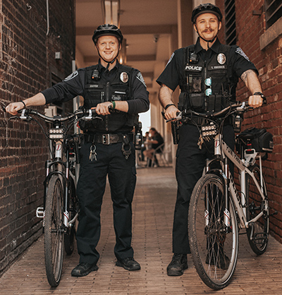 Officers on bikes near Village Park