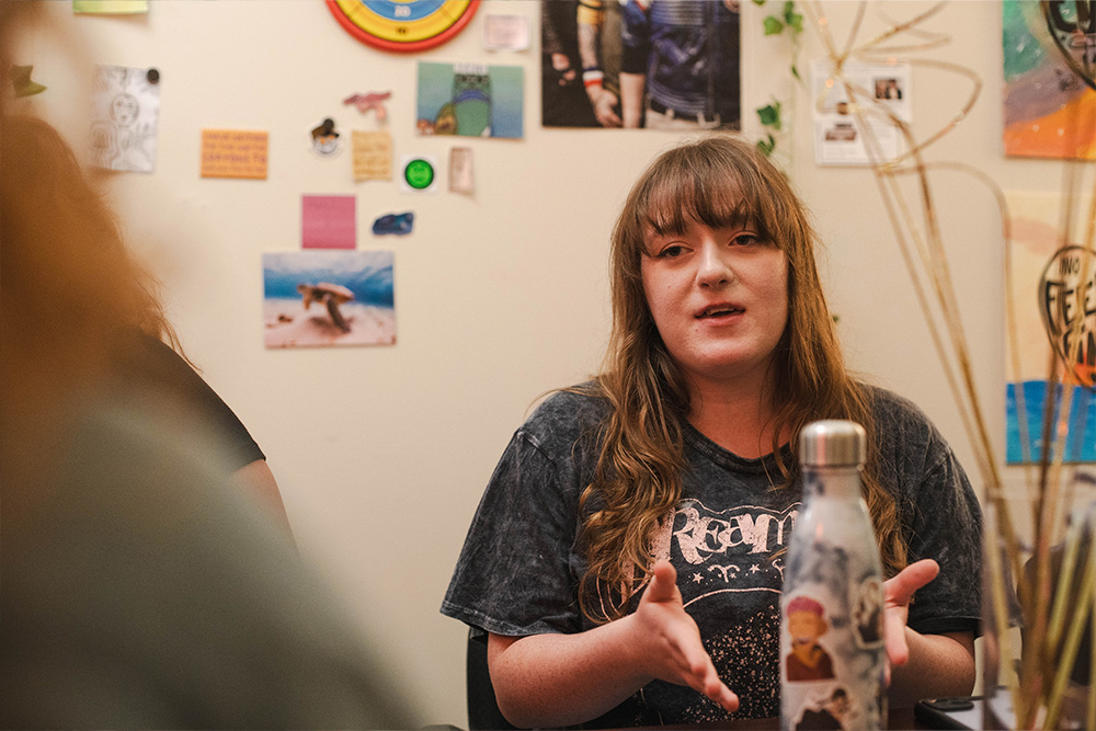 Pictured are students from the Confluence Psychology Alliance at Point Park University in discussions in their organization's office space.