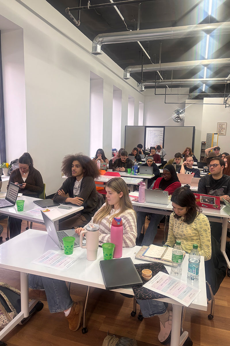 Students sit at tables in the Center for Civic and Community Engagement.