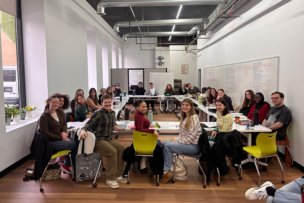 The residence directors have a meeting in the Center for Civic and Community Engagement.