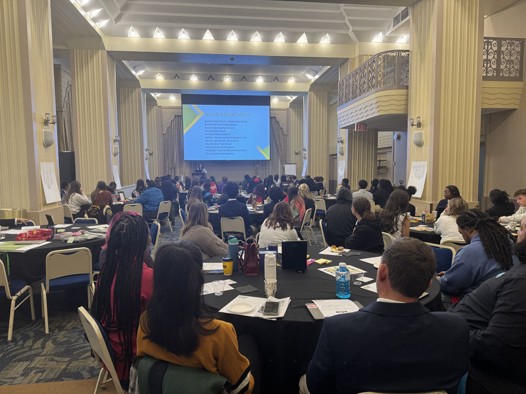 The ballroom full of high school students. 