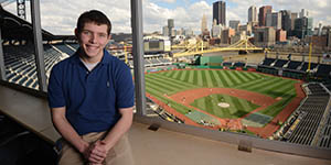 Pictured is Evan Schall, an SAEM and business management major, was photographed during his media relations internship for the Pittsburgh Pirates. Photo | Jim Judkis