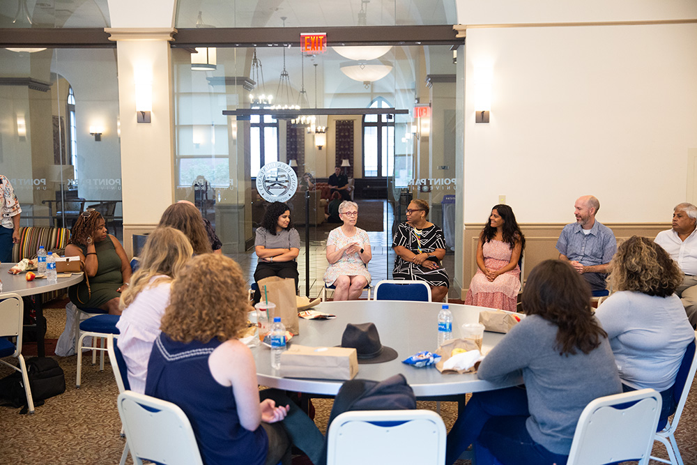 Pictured are community engagement faculty and students during the Fall 2022 welcome weekend and symposium. Photo by Randall Coleman