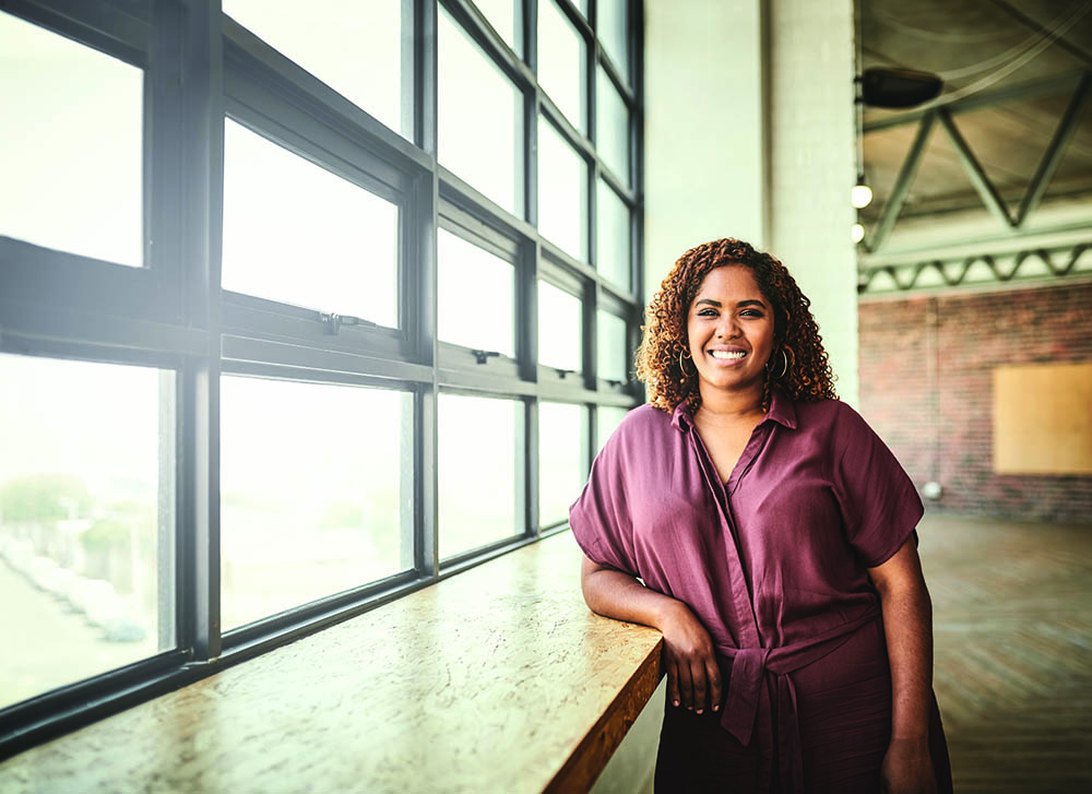 Pictured is a stock photo of a female Ph.D. student.