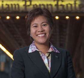 Pictured is Wiranya Ratnapinda, M.B.A. alumna, Thailand native and supervisor at Omni William Penn Hotel. | Photo by Chris Rolinson