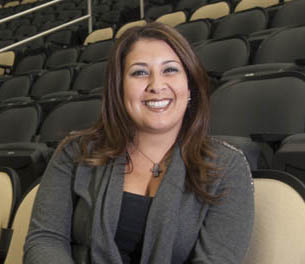 Pictured is MBA alumna Jennifer Bullano, director of communications for the Pittsburgh Penguins.