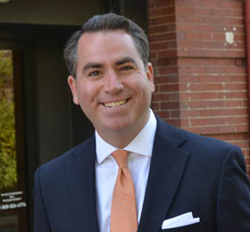 Pictured is 2013 M.B.A. alumnus David Bush, 2014 
