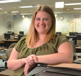 Pictured is M.B.A. alumna Kasey Betush, budget analyst for Allegheny County Emergency Services. | Photo by Jim Judkis