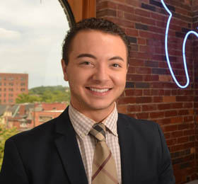 Pictured is 2013 M.B.A. alumnus Michael Mann, a business manager for Dr. Bobbie L. Hawranko's dental practice in Shadyside Pittsburgh. | Photo by Jim Judkis
