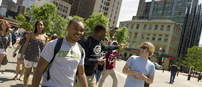 Pictured are Point Park undergraduate students in Market Square, Downtown Pittsburgh.
