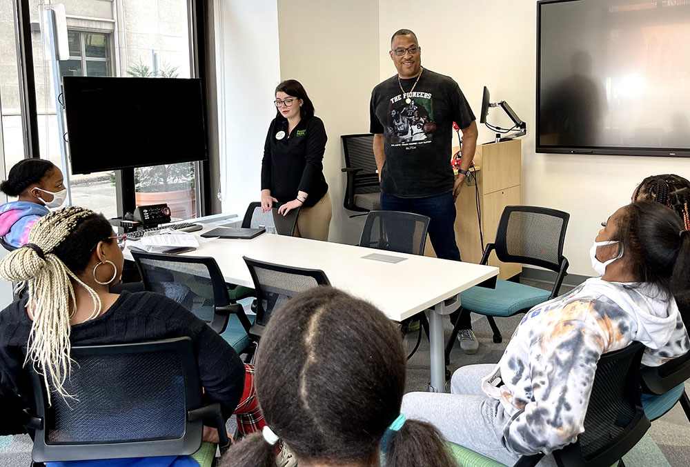 Pictured are admissions counselor Kathryn Mulvey, Chuck Cooper III and high school students during a Cooper Gibson workshop, The College Admissions Process.