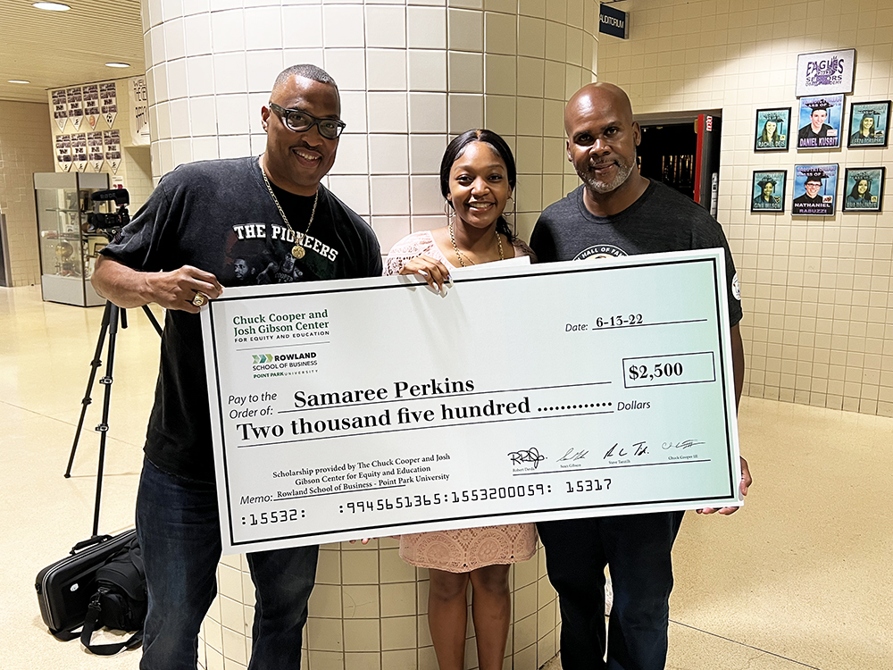 Pictured from left to right are Chuck Cooper III, student Samaree Perkins and Sean Gibson. Submitted photo.